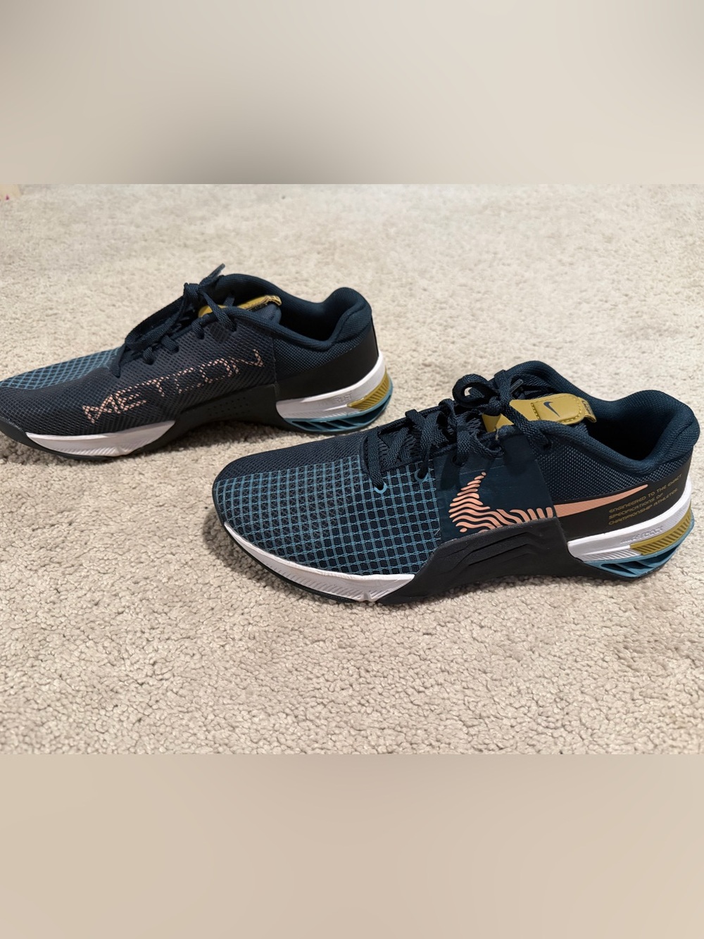Nike Men's Navy Athletic Shoes with Coral Accents and Gold Trim